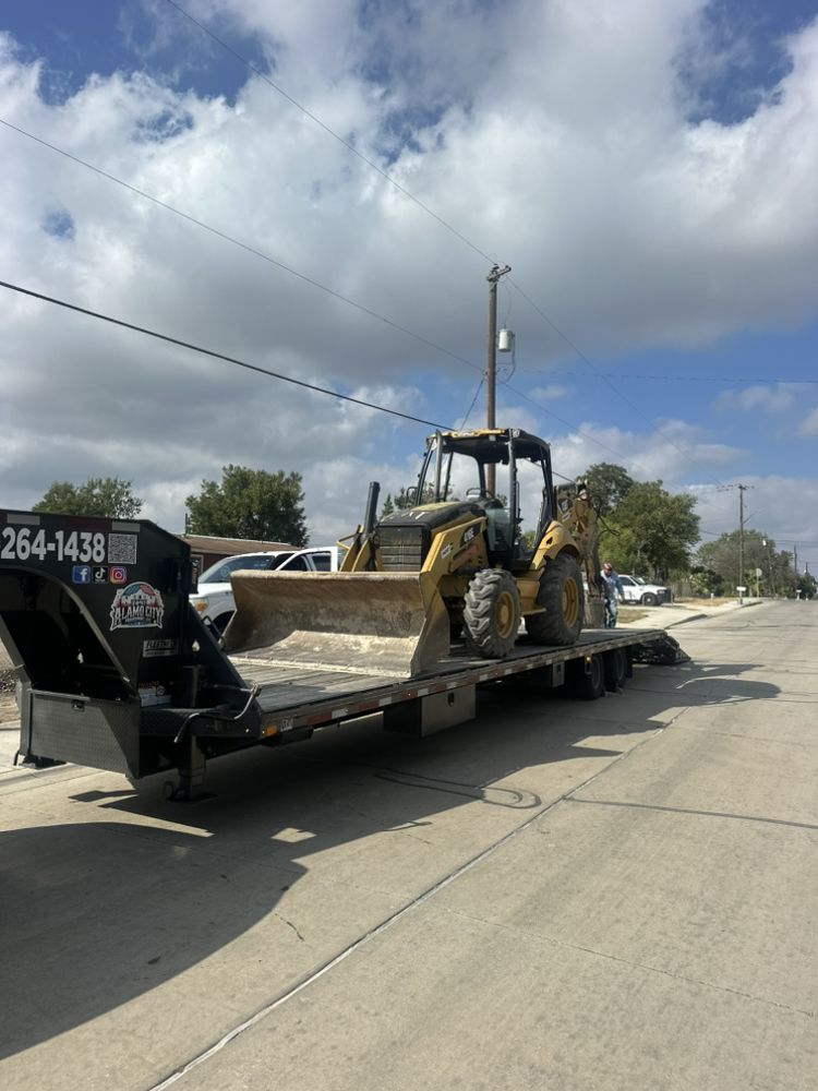 excavator on flat bed for transportation